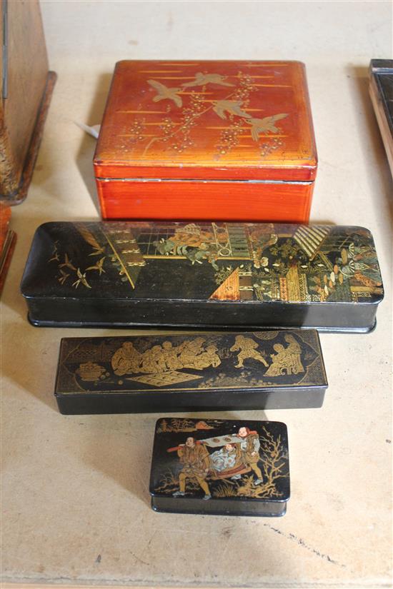 Japanese Meiji lacquered glove box, decorated figures & houses, a similar pen box & snuff box & a jewellery box decorated gilt birds